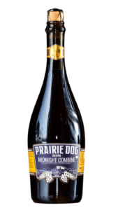 A 750mL bottle of the second edition of Prairie Dog Brewing's Midnight Combine, released in 2020.