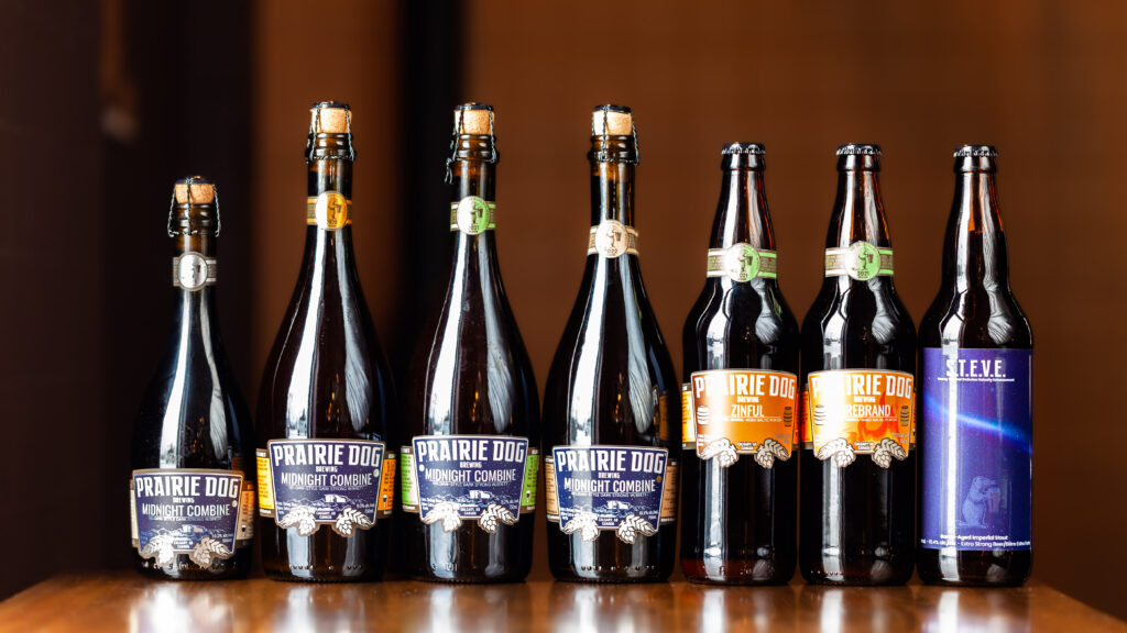 A full spectrum of Prairie Dog Brewing limited/special-release bottled beer products.