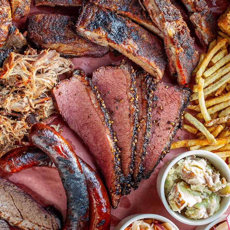 Gabe Morris performing on stage at Prairie Dog Brewing for Canada Day 2025.