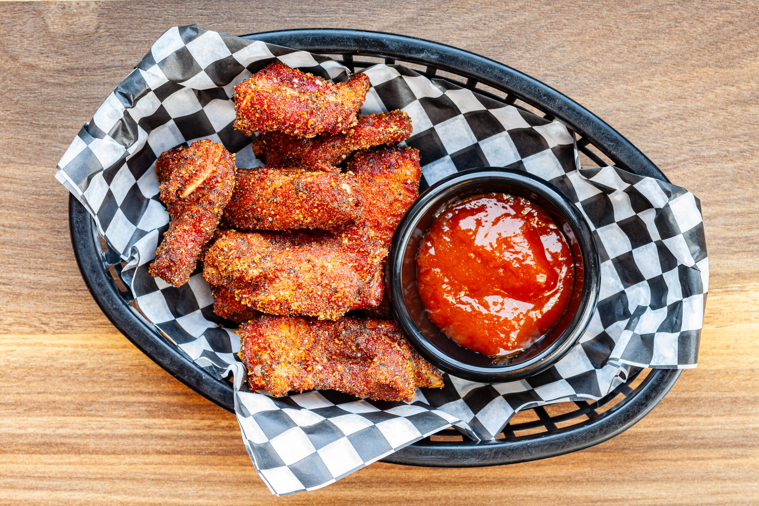 Basket of Tennessee Dry Ribs with sauce